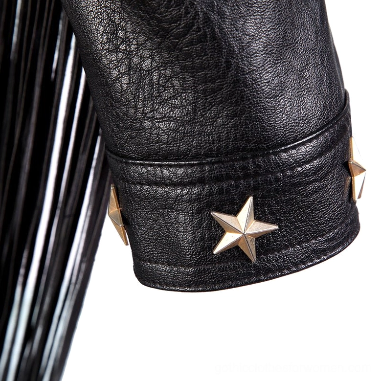 Close-up detail of gothic biker jacket cuff showing pebbled black PU leather texture and bronze star stud decoration