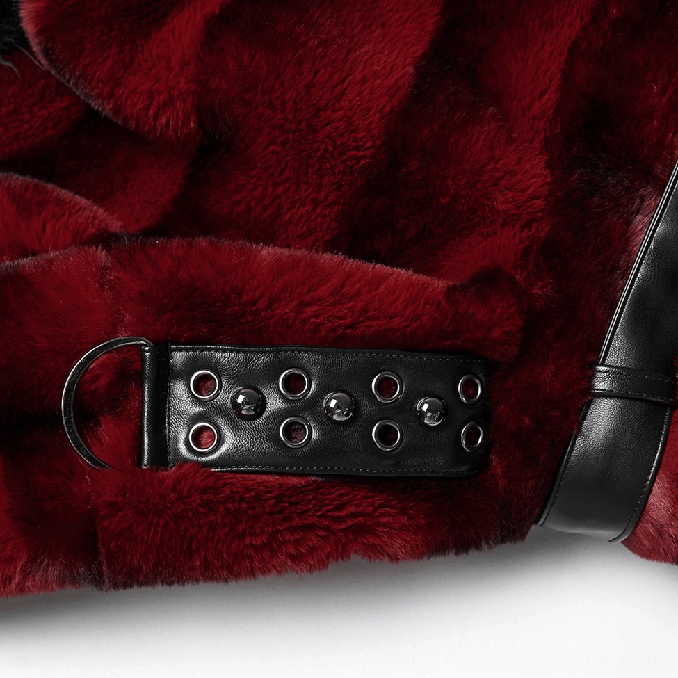 close-up detail of studded black PU leather shoulder strap on burgundy faux fur gothic jacket