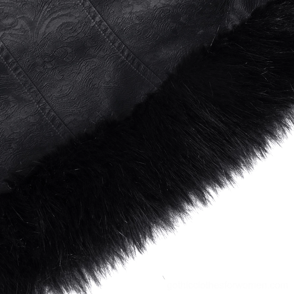 Black gothic jacket buckle fastening system - close-up of vintage hardware and chain trim