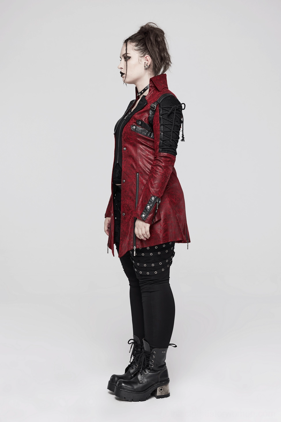 Gothic jacket waist detail emphasizing fitted tailoring and leather panel contrast design