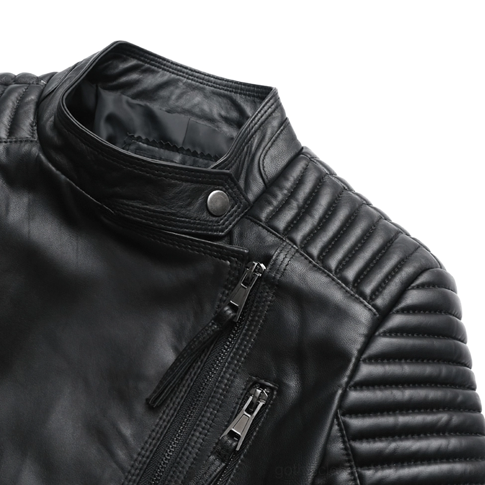 Close-up detail of women's leather gothic jacket silver zipper and quilted shoulder panels