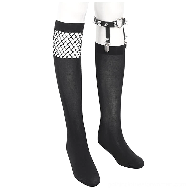 Mannequin leg pair displaying matching gothic knee-high stockings with asymmetrical design featuring fishnet splice and metal heart buckle garter