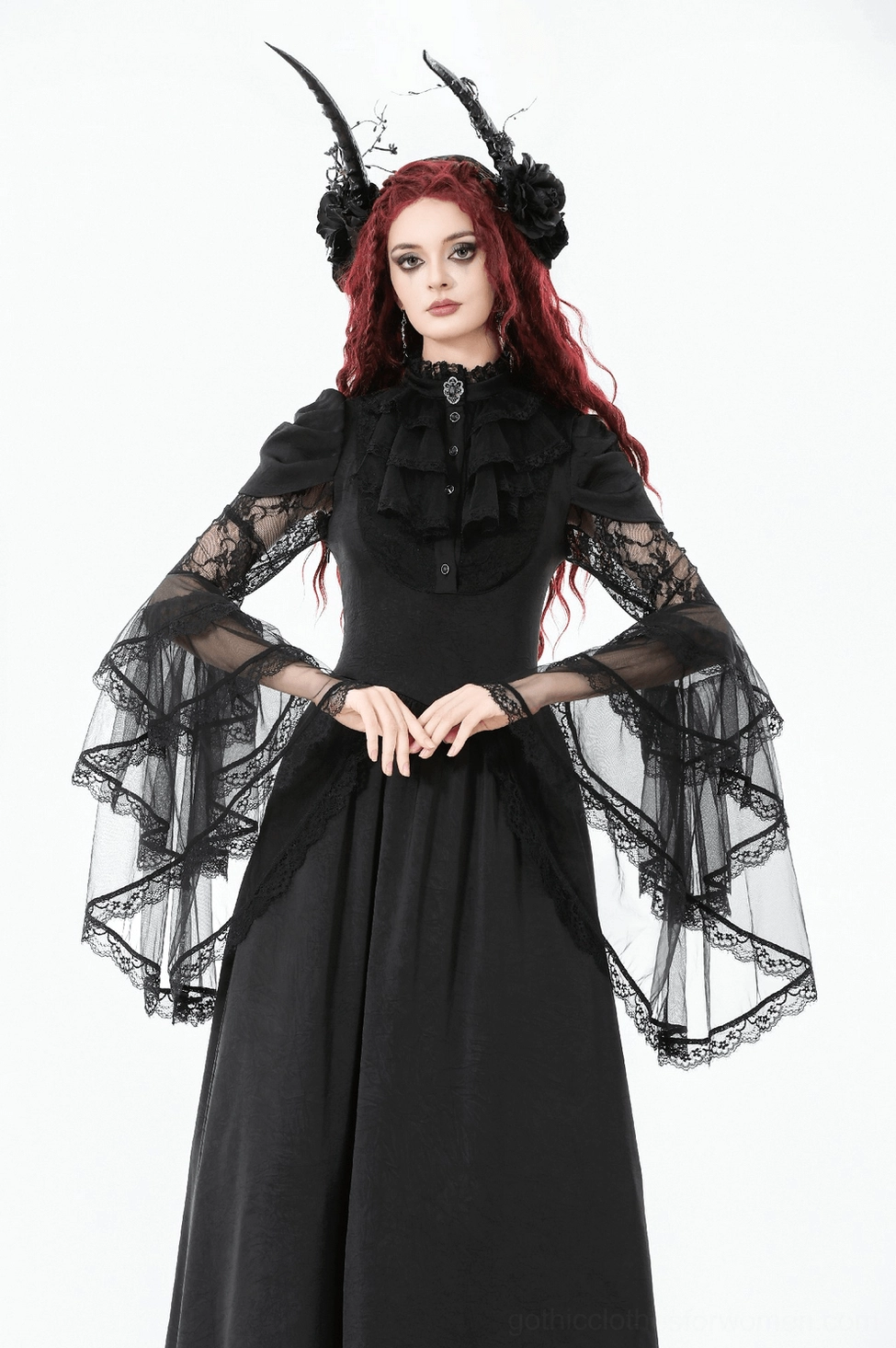 Model wearing black gothic lace bell-sleeve maxi dress showing fit and silhouette with high neckline and flowing skirt