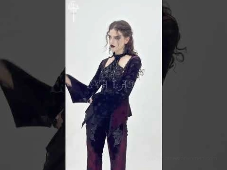 Wine red gothic bell sleeve lace top styled on model with dark trousers showing side silhouette and fitted construction