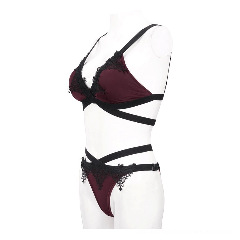 Burgundy gothic lace bikini left three-quarter mannequin view showing side cross straps and lace hem detail