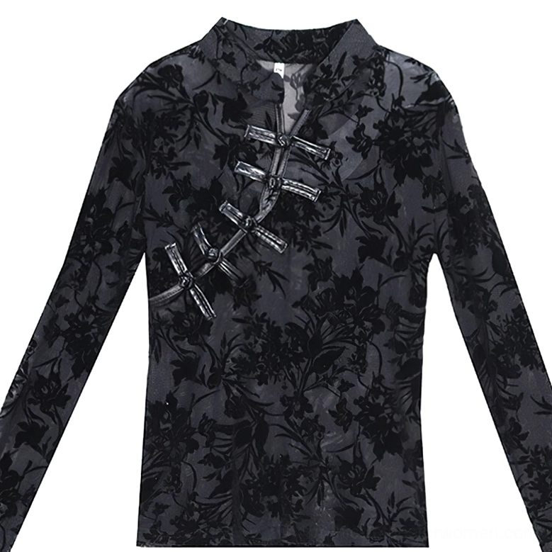 Black gothic lace blouse flat lay product shot showing sheer mesh construction, delicate floral pattern details, and frog button closure system