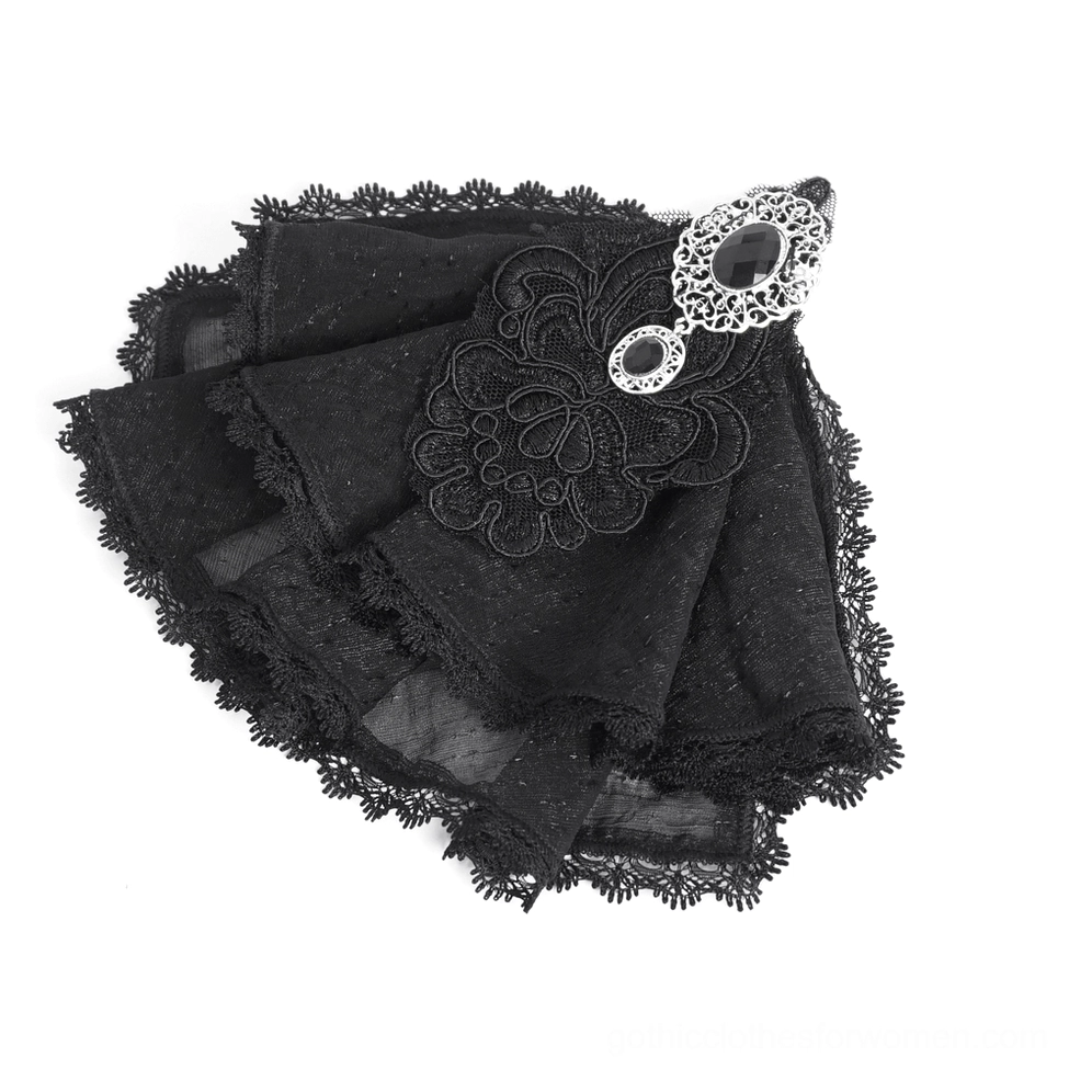 Black lace blouse texture detail showing jacquard lace weave and fabric quality close-up