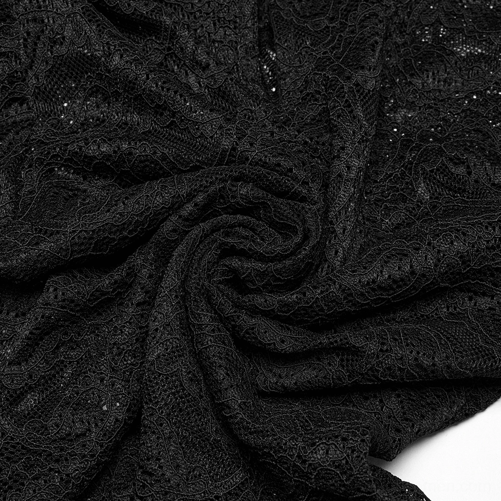 Detailed close-up of black paisley lace fabric on gothic blouse showing intricate pattern weave and sheer see-through material with draped texture