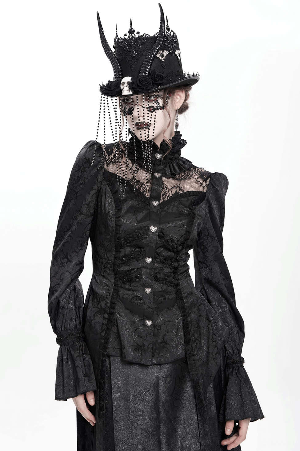 Gothic lace blouse sleeve detail, ruffled cuff finishing, bell sleeve shape