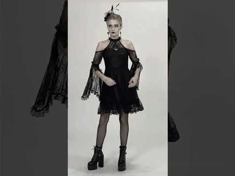 Black lace gothic cold shoulder dress with bell sleeves worn with platform boots