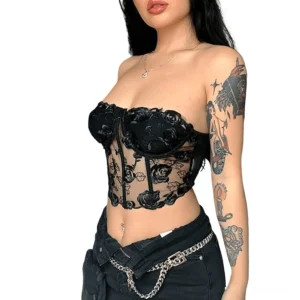 Black strapless floral lace corset crop top side-front view on tattooed model, displaying sheer mesh fabric and rose embroidery pattern