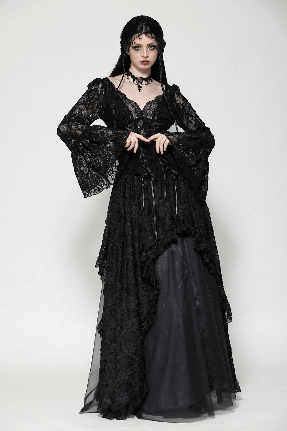 Side view of gothic lace corset top showing silhouette shaping and bell sleeve construction