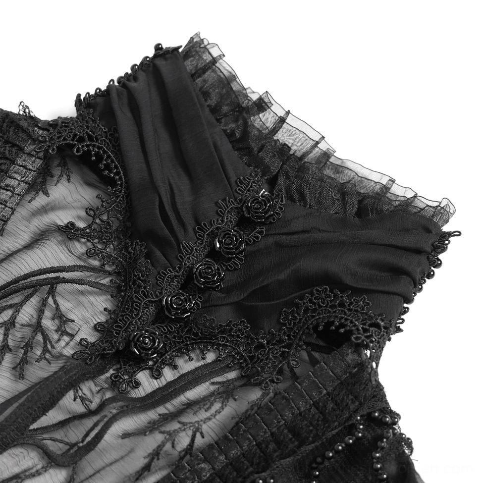 Close-up detail of black gothic dress branch lace embroidery with rose appliqués and beaded mesh trim