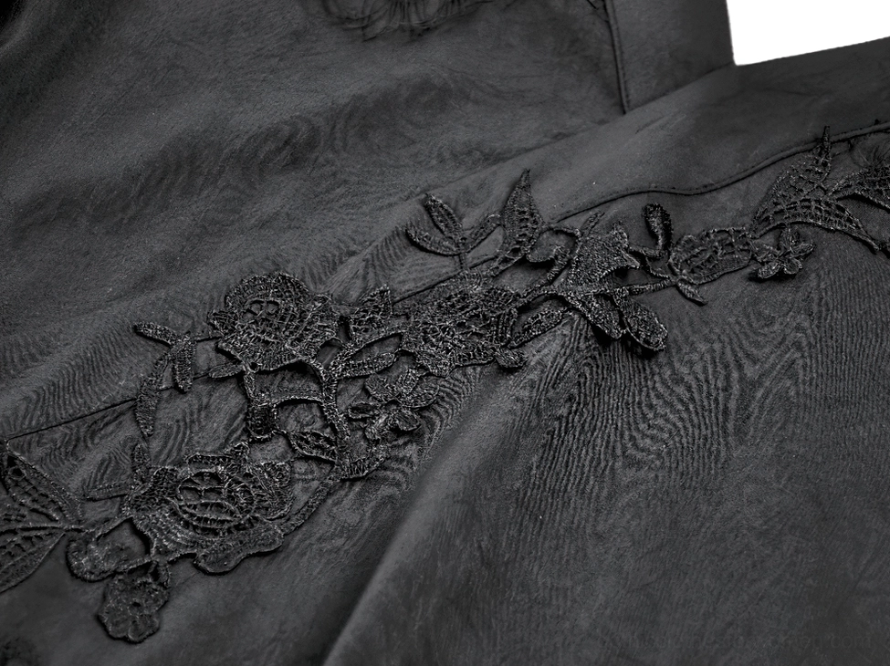 Black gothic dress close-up showing lace embroidery texture and matte polyester fabric quality