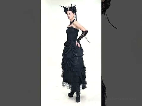 Side profile of black gothic lace midi dress with fitted corset bodice and ruffled skirt detail