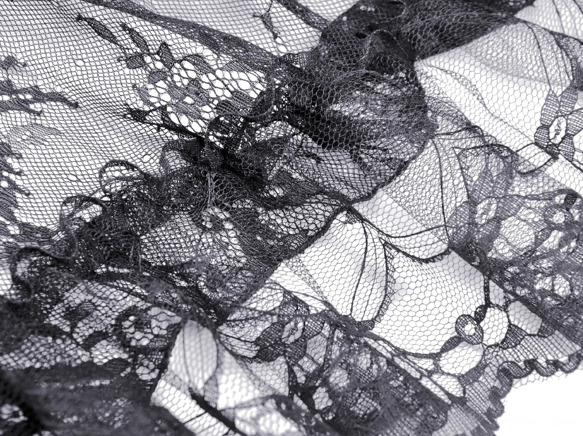 Black gothic lace dress waist and silhouette detail highlighting slim fit design