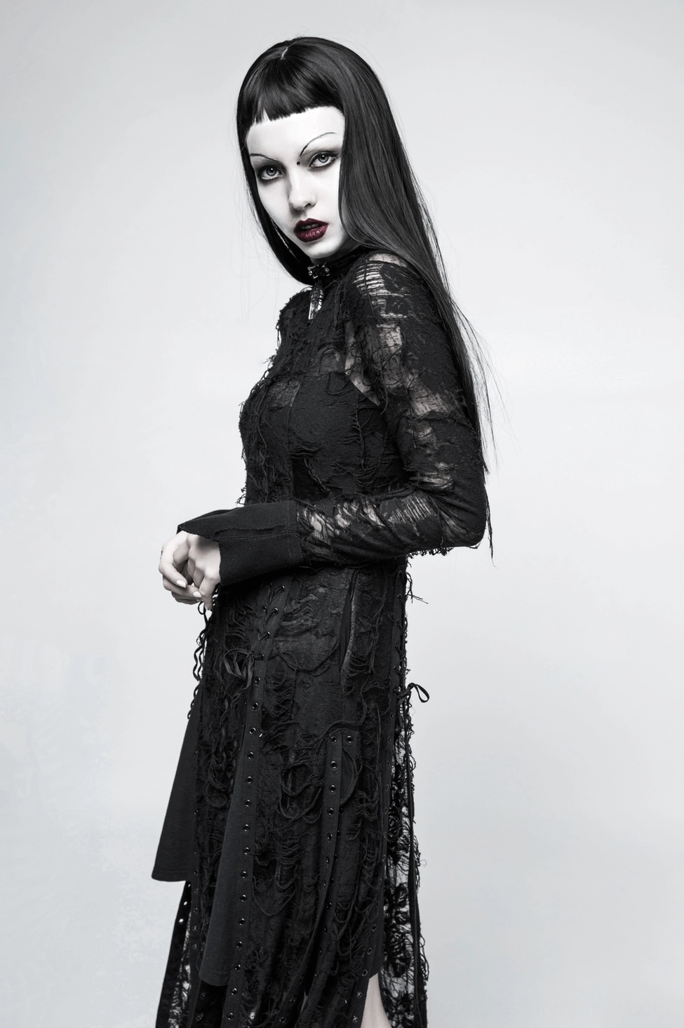 Black gothic lace dress styled presentation showing architectural design and layering possibilities