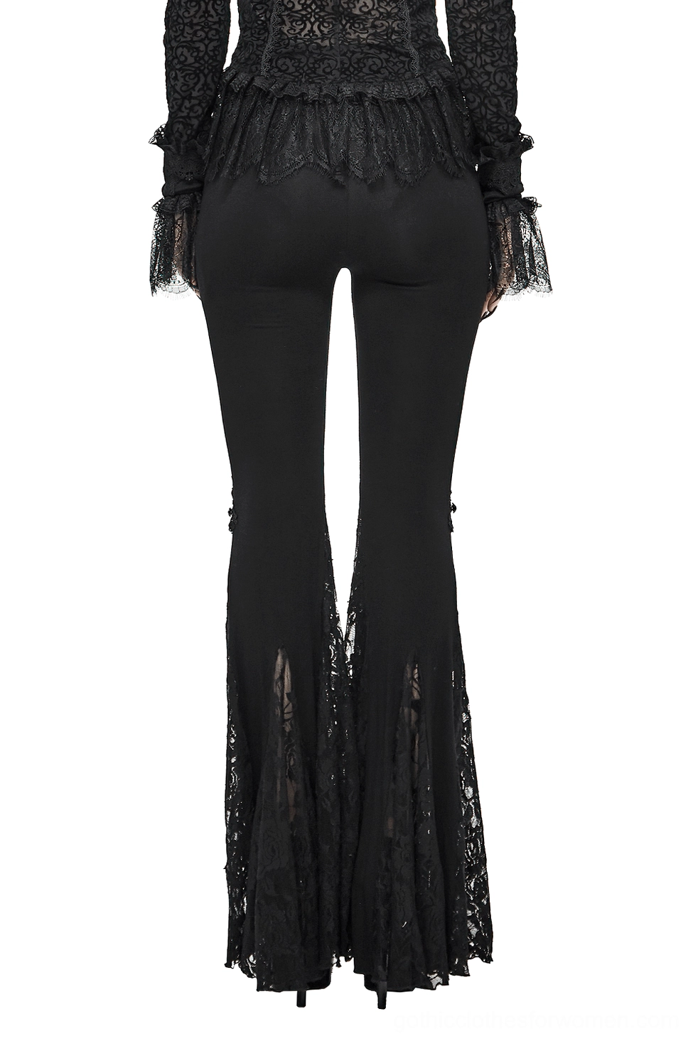 Rear view of high-waisted black gothic lace bell-bottom leggings on model, displaying sheer ruffled lace pant legs and flared silhouette