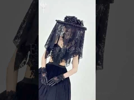 Black lace gothic gloves styled with dark goth outfit and lace veil complete ensemble