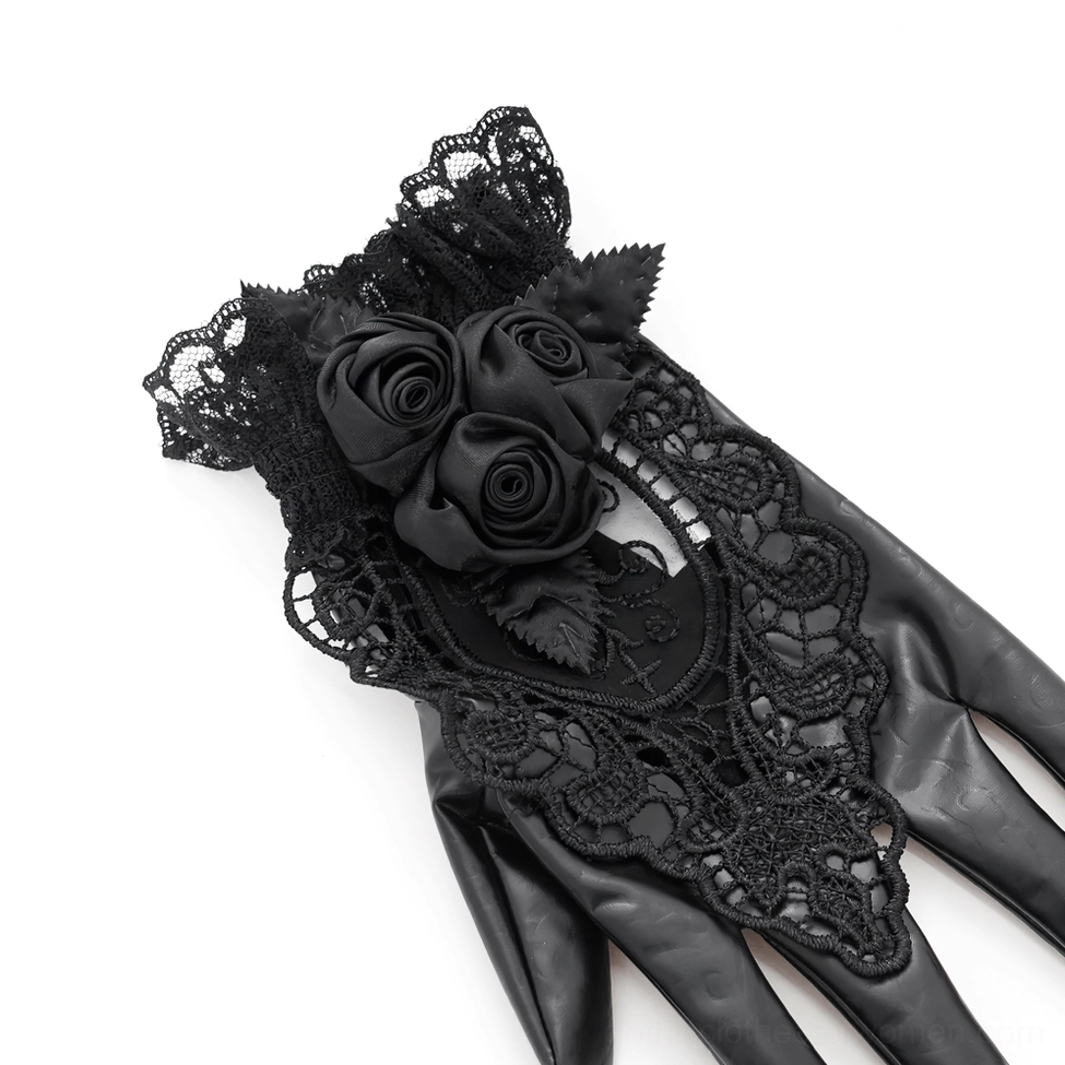 Top-down view of gothic black lace rose gloves showcasing dimensional satin flowers and lace overlay