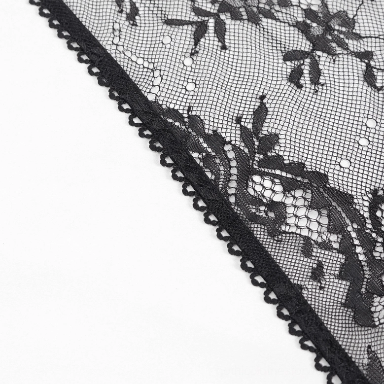 Black lace gothic lingerie set close-up of garter attachment and irregular hem design