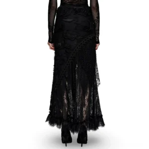 Black ripped lace maxi skirt back view on model, displaying sheer lace lower panel and ruffled asymmetric hemline