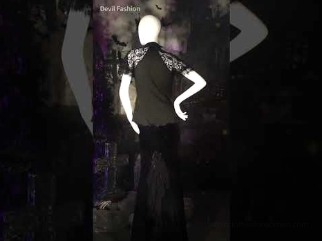 Gothic lace raglan blouse side angle view displaying fitted cut and dark studio aesthetic