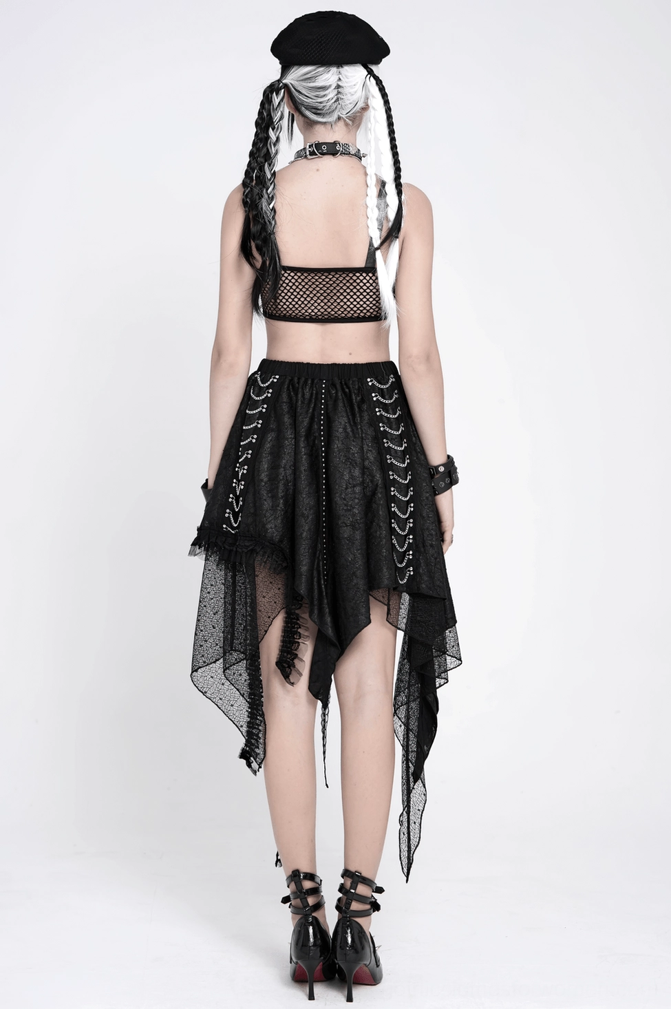 Black gothic lace midi skirt with chain trim, showing asymmetric hem drop and textile layering detail