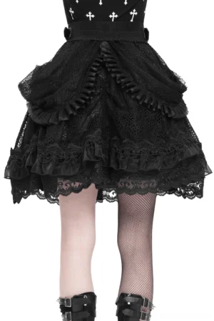 Back view of black victorian lace layered skirt showing draped ruffled panels and ornate leather waist belt