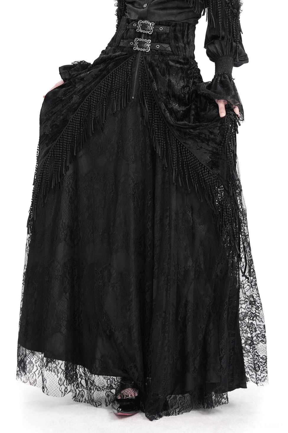 Black lace Victorian gothic maxi skirt with corset waist and tassel details, front view on female model against white background