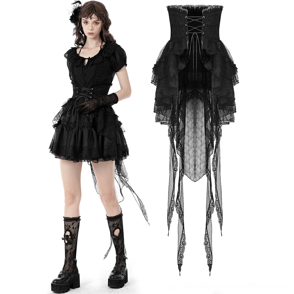 Full model wearing black gothic lace skirt with detachable tail and matching lace gloves on white background