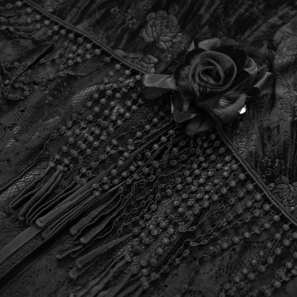 Black gothic lace skirt layered construction showing sheer overlay panels and structural design elements