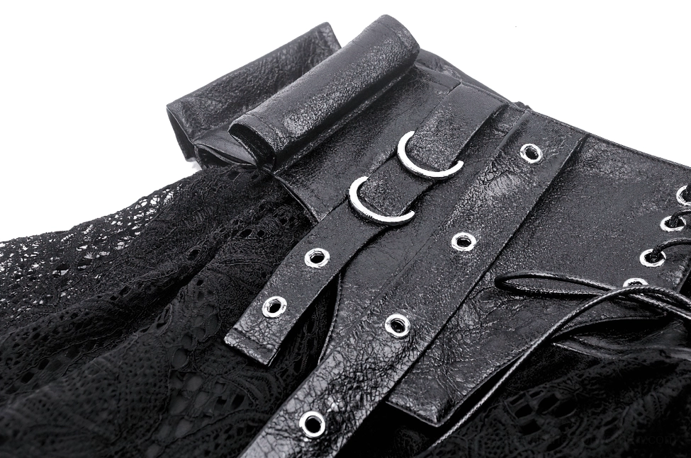 Distressed faux leather waist strap with metal D-rings and black lace base fabric close-up detail