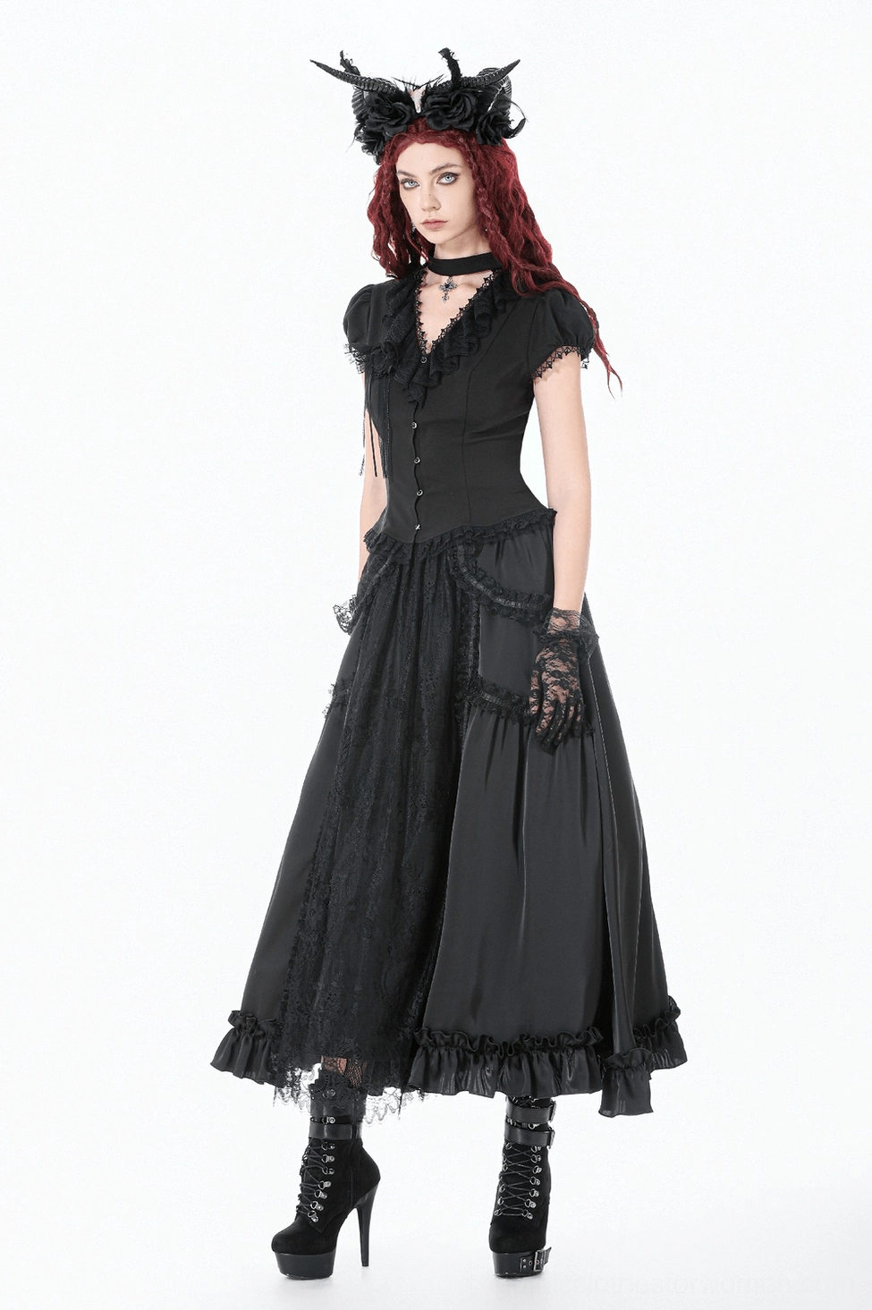 Black gothic lace maxi skirt demonstrating flow and movement with ruffled hem and sheer overlay