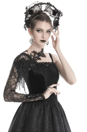 Black lace sleeve with floral appliqués worn by gothic fashion model, front three-quarter view showcasing elegant drape