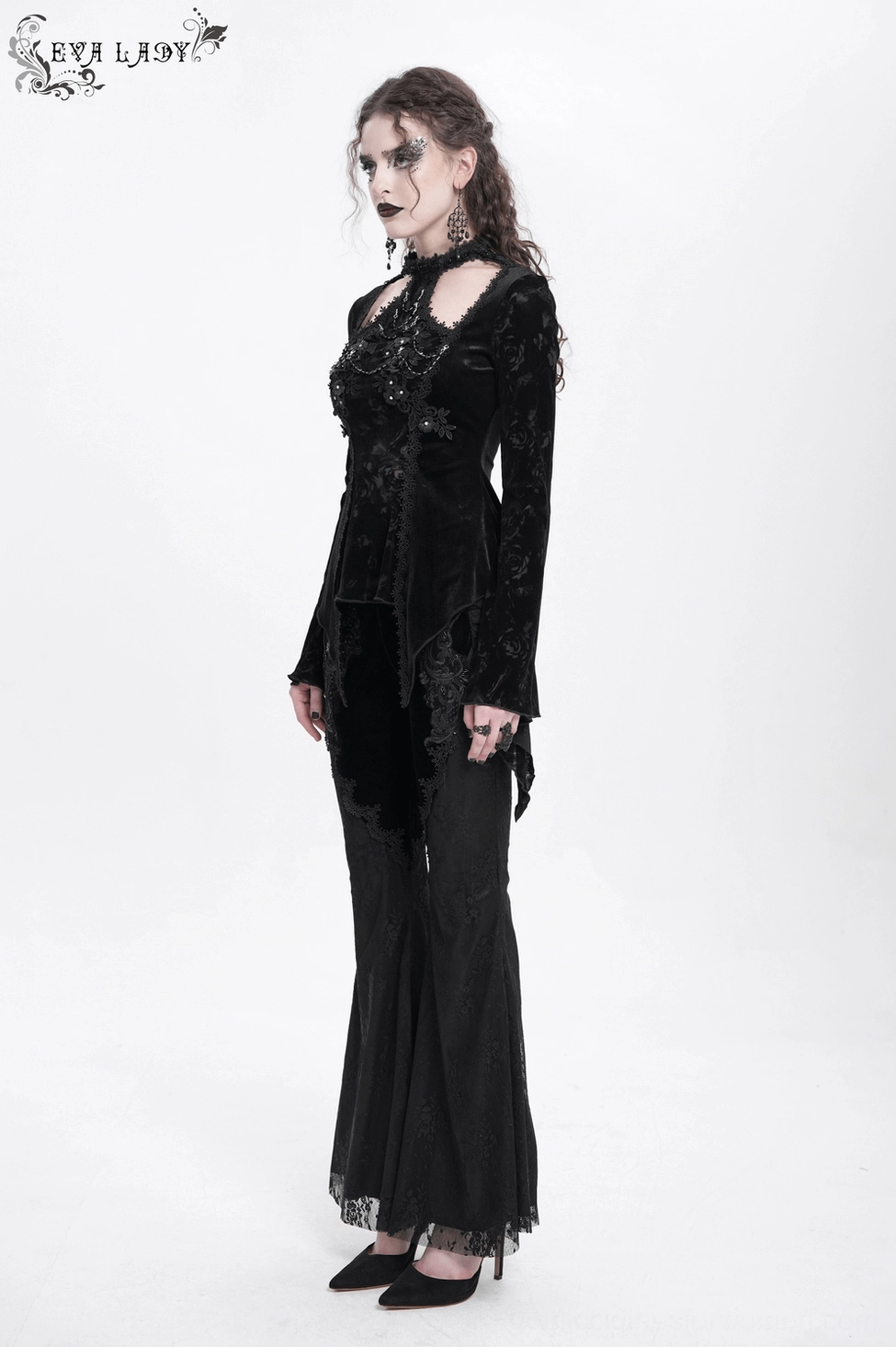 Back detail of black gothic lace top showing fitted silhouette and delicate lace sleeve construction