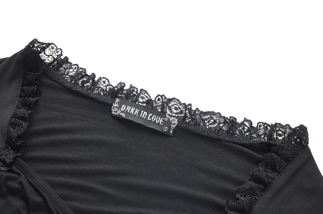 Close-up detail of sweetheart neckline with ruffled lace trim on black gothic lace top