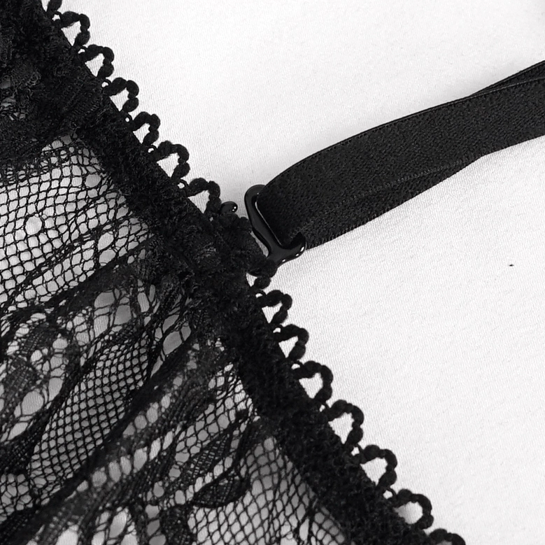 Close-up macro shot of gothic lace trim and halter strap construction
