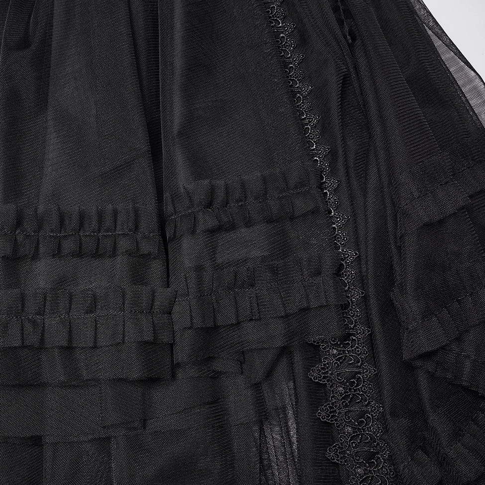 Black gothic layered mesh skirt styled with alternative fashion accessories and dark aesthetic elements