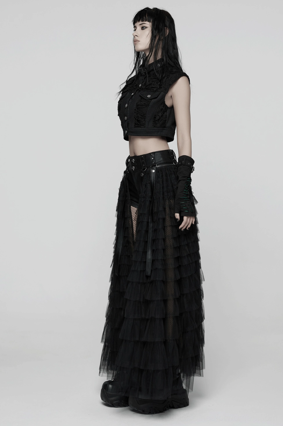 Full length view of black gothic layered tulle skirt-shorts worn with dark stockings and boots showcasing silhouette