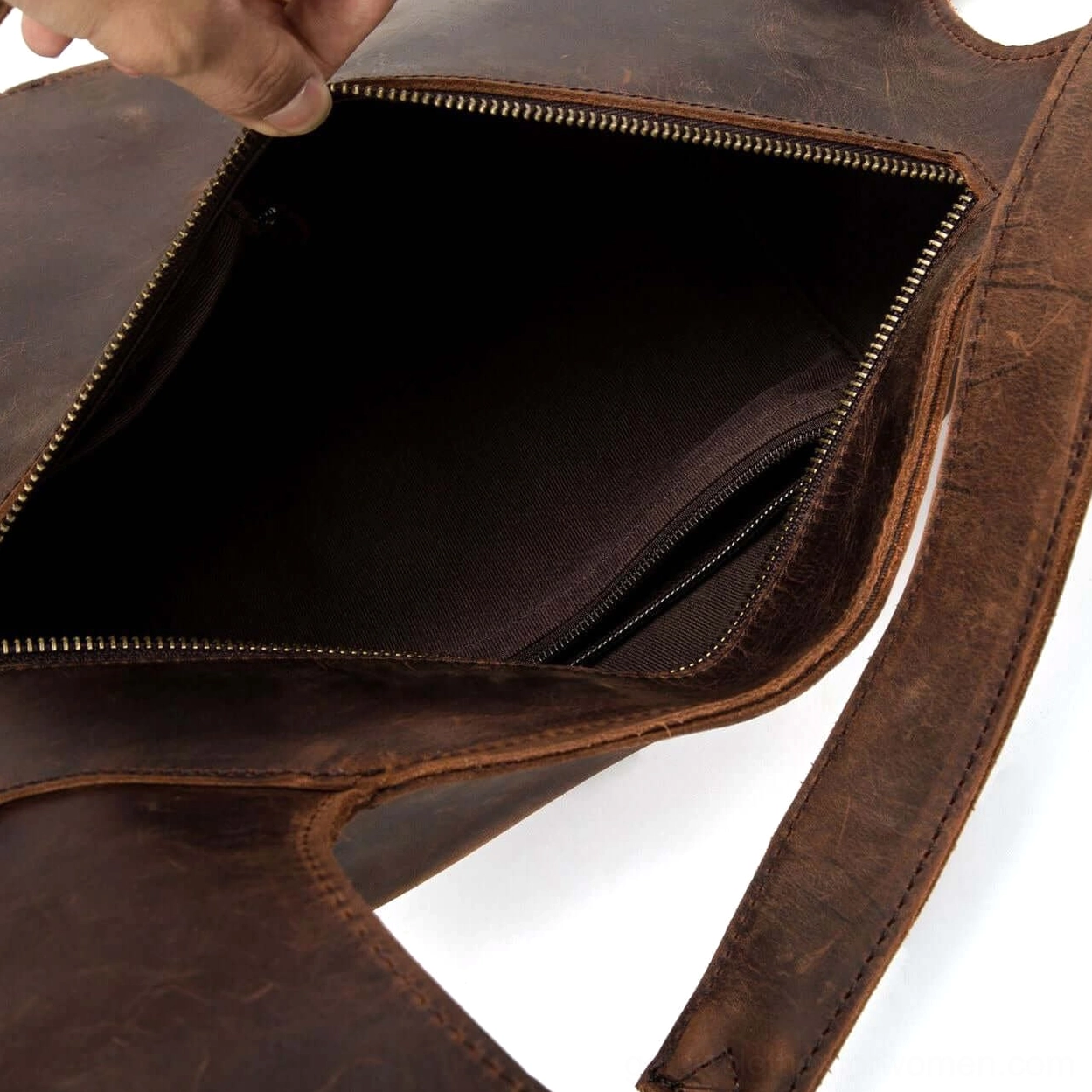 Gothic leather backpack anti-theft compartment detail with secure zipper pocket design