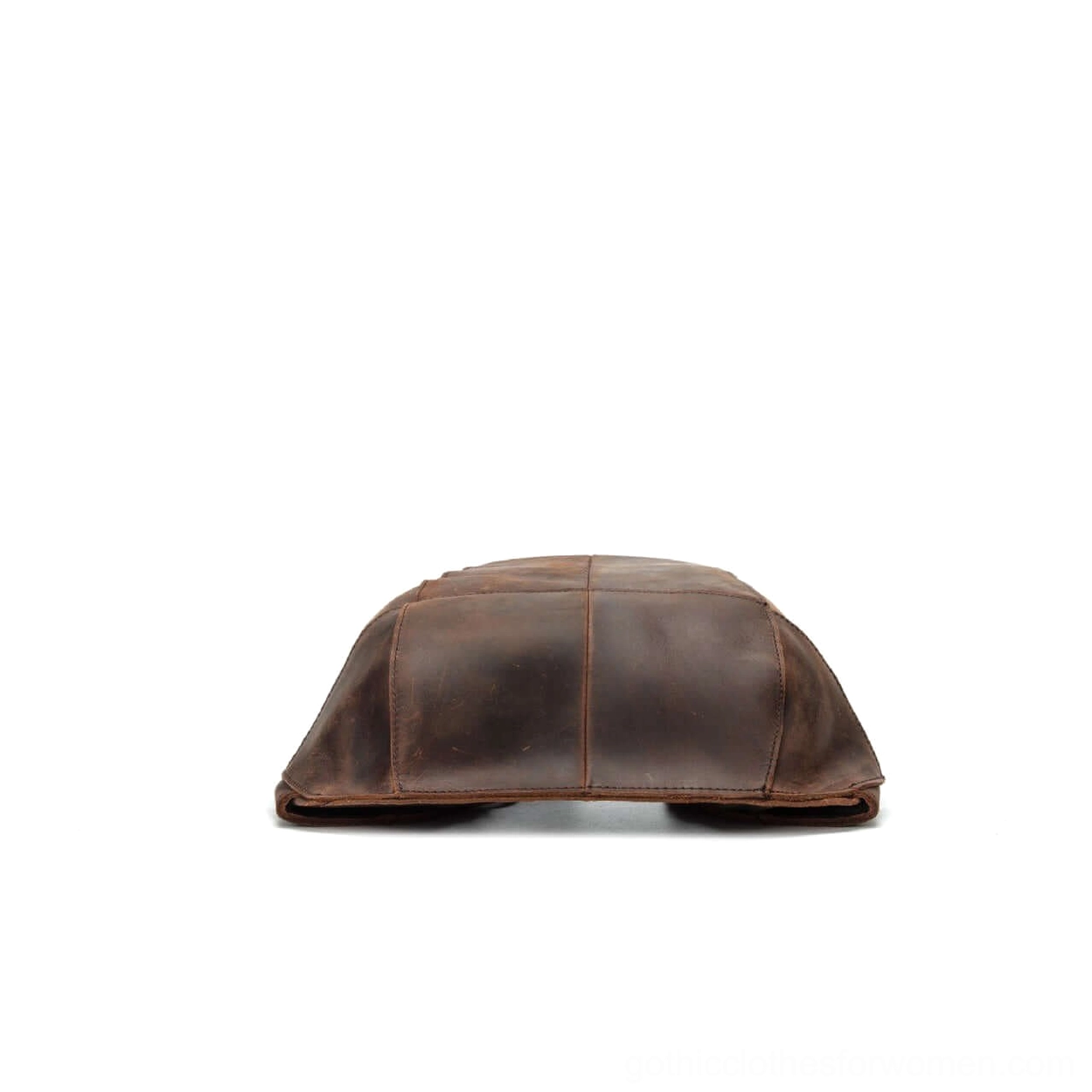 Flat dark brown leather gothic backpack base top-down view showing compact paneled construction