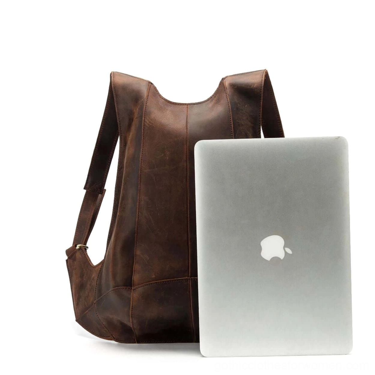 Tan leather gothic backpack angled view displaying multi-compartment organization and soft handle design