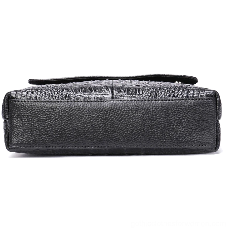 Dark gothic leather shoulder bag top side profile view showing bag depth and smooth construction