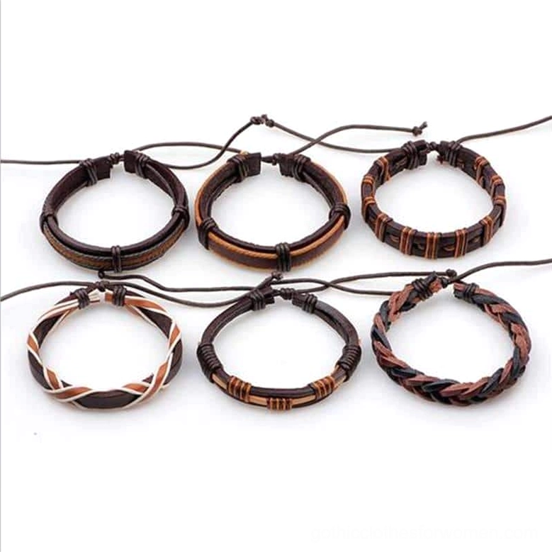Complete 6-piece gothic leather bracelet set overhead arrangement, showing mixed woven and woven ring styles with braided rope elements