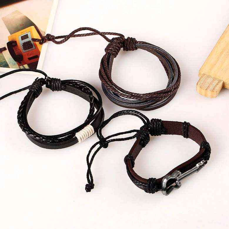 Set of multi-layer gothic leather bracelets with guitar charms and adjustable knots