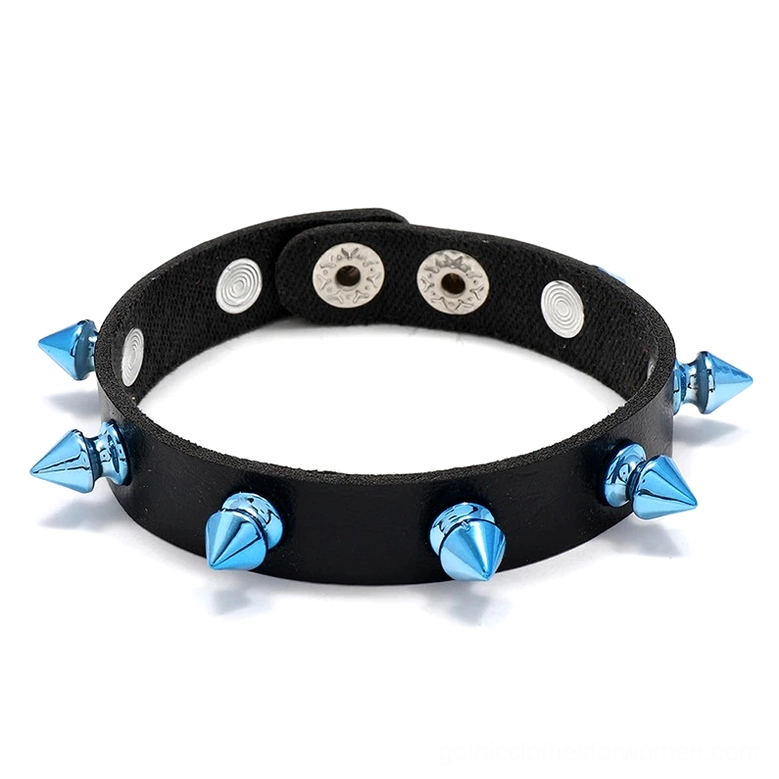 Black gothic leather cuff bracelet with blue cone studs flat lay top view punk spike bangle