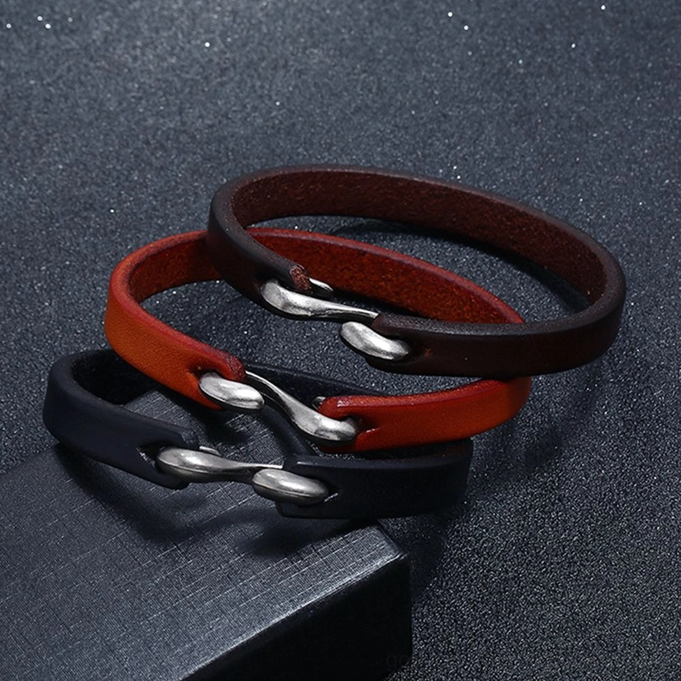 Three-piece mixed color leather narrow cuff bangle collection in black, tan, and burgundy - gothic bracelet set display