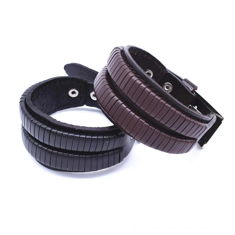 Gothic leather cuff bracelets front flat lay showing adjustment holes and metal hardware on black and brown options