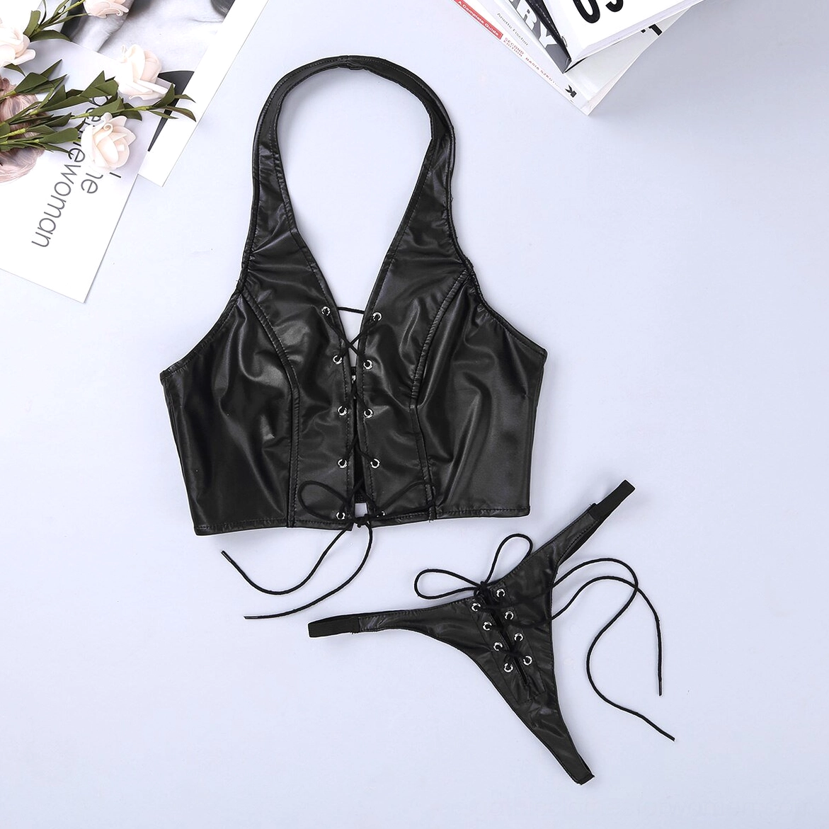Black faux leather gothic lingerie set complete ensemble with adjustable halter lace-up and form-fitting thong